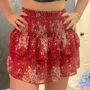 Cute double ruffle, thick waisted red floral skirt.